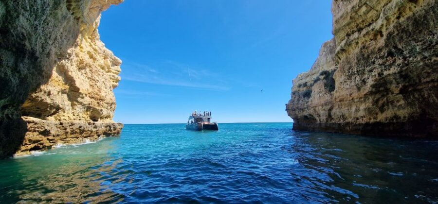 Albufeira: Coastline and Benagil Caves Tour by Catamaran - Approaching Benagil: what it’s like to get up close