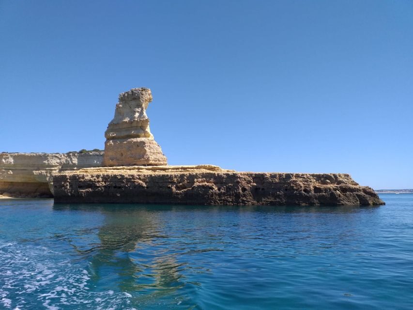Albufeira: Coastline and Benagil Caves Tour by Catamaran - Guide style and multilingual commentary: what you’ll get out of it
