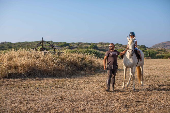Horse Riding in Portugal - Picadero Kids - The first steps: helmets, setup, and getting oriented