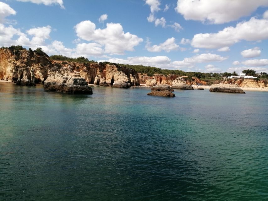Lagos: 2-Hour Evening Champagne Cruise - The evening route: Praia da Batata, Dona Ana, and Camilo